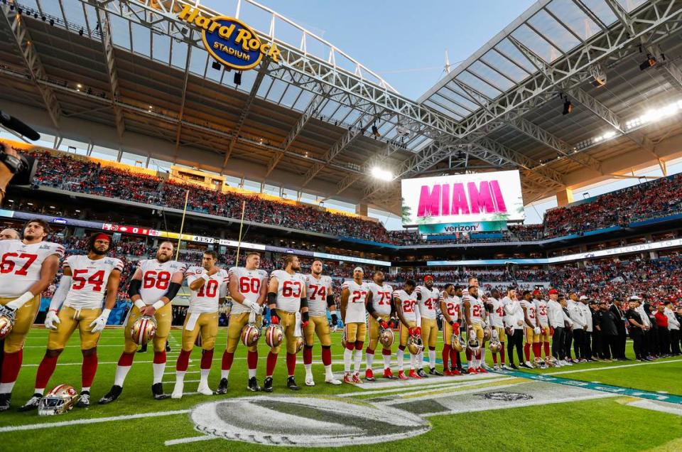 The San Francisco 49ers gather on the field before playing against the Kansas City Chiefs during Super Bowl 54 at Hard Rock Stadium on Sunday, February 2, 2020 in Miami Gardens, Florida.