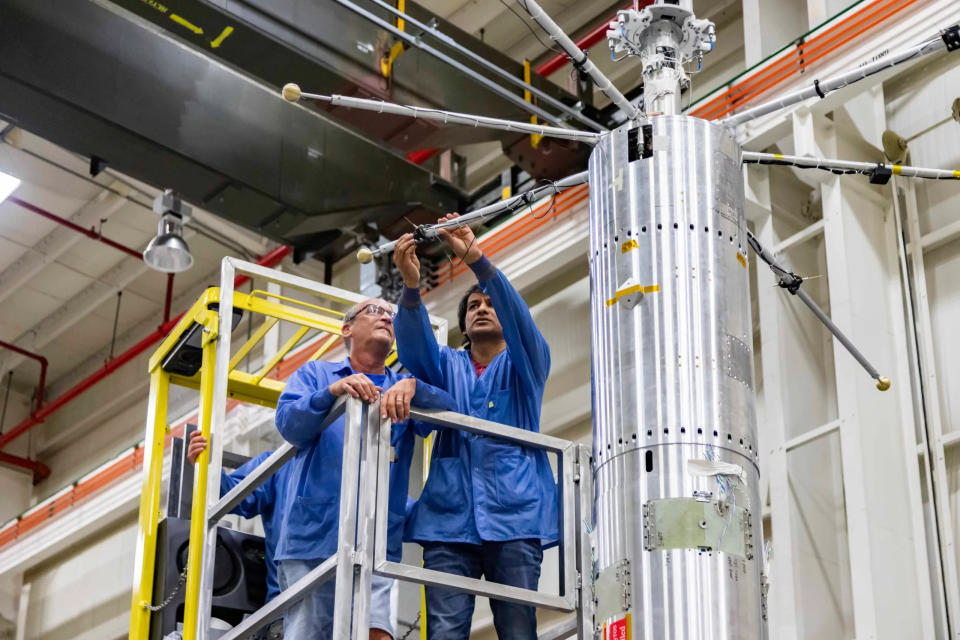 Mechanical technician John Peterson of NASA’s Wallops Flight Facility and APEP mission leader Aroh Barjatya check the sensors on the rocket. <em>NASA’s Wallops Flight Facility/Berit Bland</em>