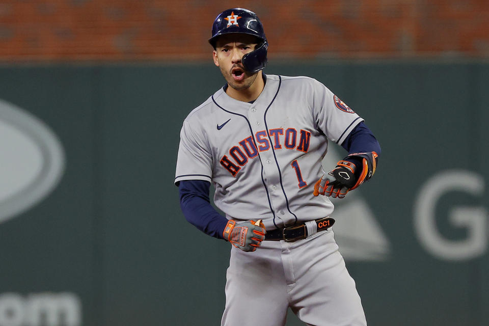 ATLANTA, GEORGIA - OCTOBER 31:  Carlos Correa #1 of the Houston Astros celebrates after hitting an RBI double against the Atlanta Braves during the third inning in Game Five of the World Series at Truist Park on October 31, 2021 in Atlanta, Georgia. (Photo by Kevin C. Cox/Getty Images)