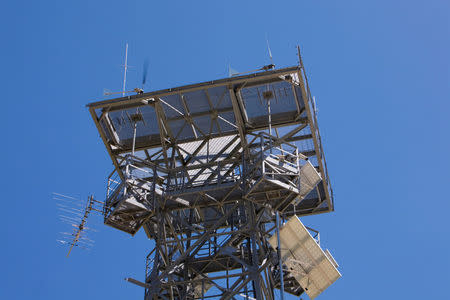 Solar panel and antenna tower at Jerry McMullin's bunker stand 100-feet tall in Yellow Jacket, Colorado, U.S. in this May 2012 photo released on September 21, 2017. Courtesy Jennifer Koskinen/Handout via REUTERS