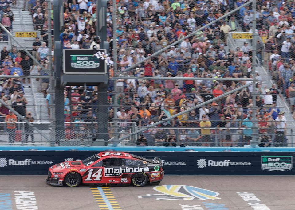 Mitchell's Chase Briscoe takes the checkered flag at Phoenix Raceway to claim his first NASCAR Cup Series victory.