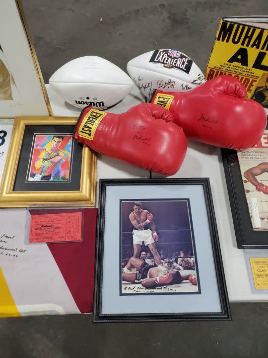 Several of the Muhammad Ali-signed items being auctioned off by his former attorney, Paul Jancha beginning April 21, 2024. (AuctionMonthly.com)