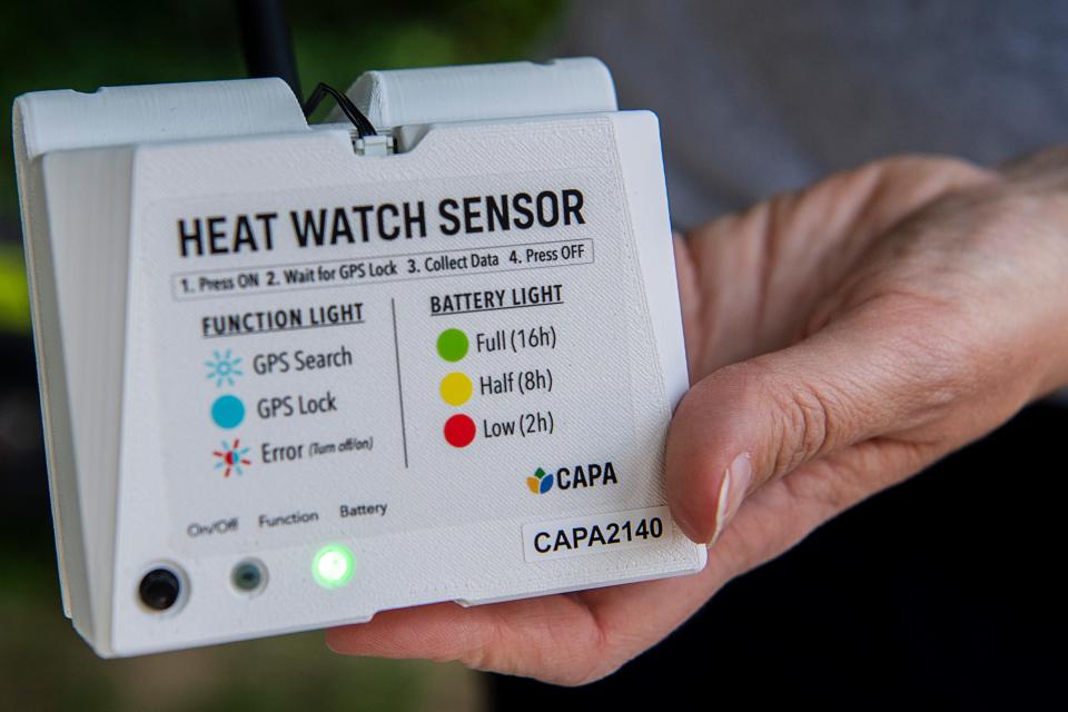 Nicole McNeill, marketing and communications director for GreenWorks, explains how sensors will record a heat mapping survey of Asheville July 25, 2023.