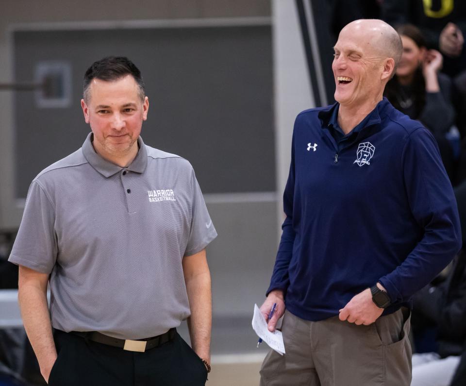 Winnacunnet's Jay McKenna, left, and Exeter's Jeff Holmes share a laugh during warmups prior to Friday's Division I boys basketball game. McKenna has been the head coach at his alma mater for 19 years, and Holmes is in his 27th year as Exeter's head coach. The two have enjoyed being part of arguably one of New Hampshire's best rivalries.