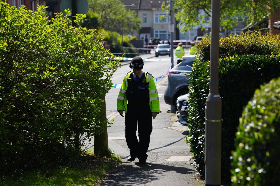 A police officer secures the scene after the sword attack (Getty Images)