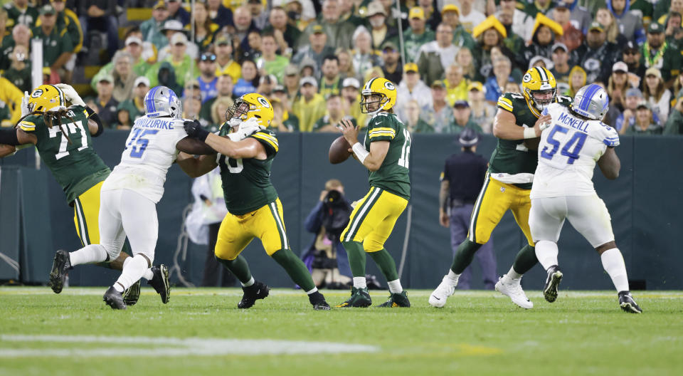 Green Bay Packers quarterback Aaron Rodgers (12) looks to throw the ball against the Detroit Lions during an NFL football game Monday, Sept 20. 2021, in Green Bay, Wis. (AP Photo/Jeffrey Phelps)