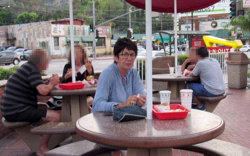 Ghislaine Maxwell in the 'faked' picture at a burger bar in LA - MEGA/FRIDA