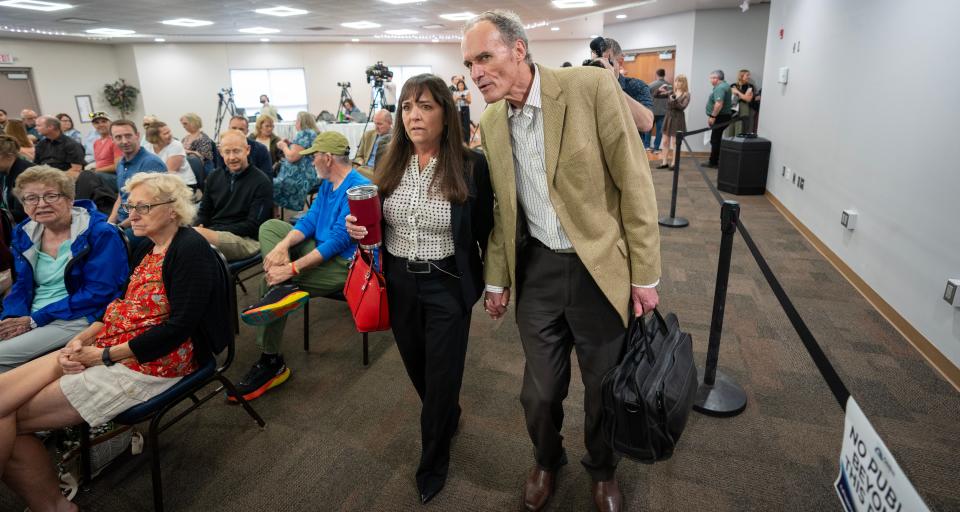 Former UW-La Crosse Chancellor Joe Gow and his wife, Carmen Wilson, arrive at a disciplinary hearing to decide whether he should be fired as a faculty member from the University of Wisconsin-La Crosse on Wednesday in Onalaska. Gow led UW-La Crosse for nearly 17 years until the UW Board of Regents removed him as chancellor last December after discovering he and his wife had created sex tapes, sometimes with adult film stars, and posted them on porn websites.