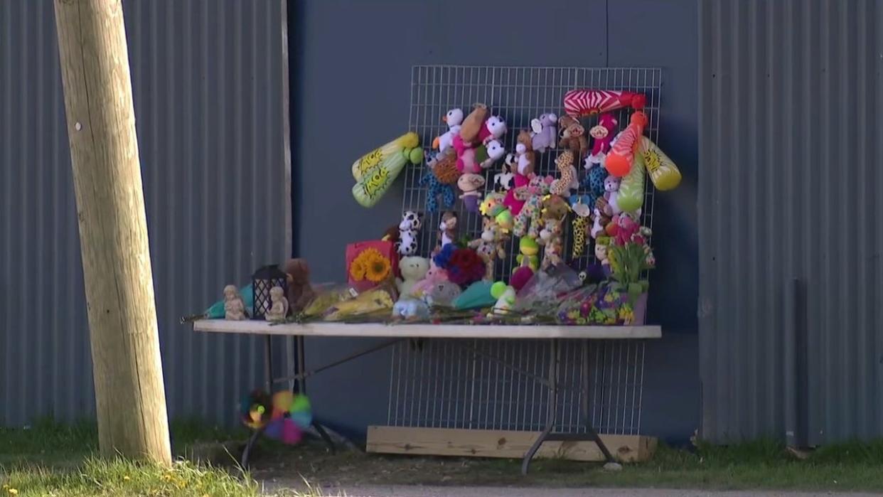 <div>Flowers and toys at the site of the crash that killed two children attending a birthday party on Saturday, April 20, 2024.</div>