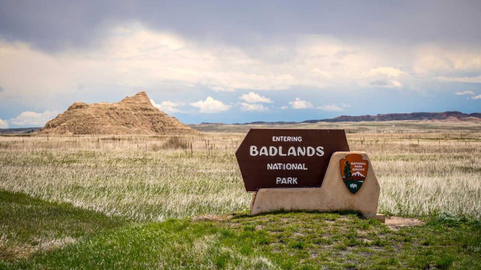 An entrance road going to Badlands National Park, South Dakota