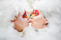 <p>Two carnival revellers pose as they celebrate the start of the hot season on Women’s Carnival, Feb. 23, 2017, in Cologne, western Germany. (Photo: Ina Fassbender/AFP/Getty Images) </p>