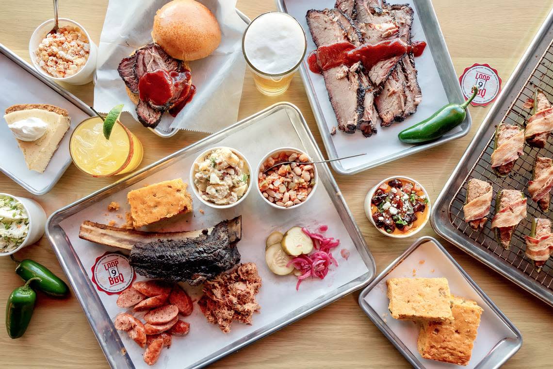 A beef rib with sides, brisket, sausage, cornbread and Key lime pie at Loop 9 BBQ.