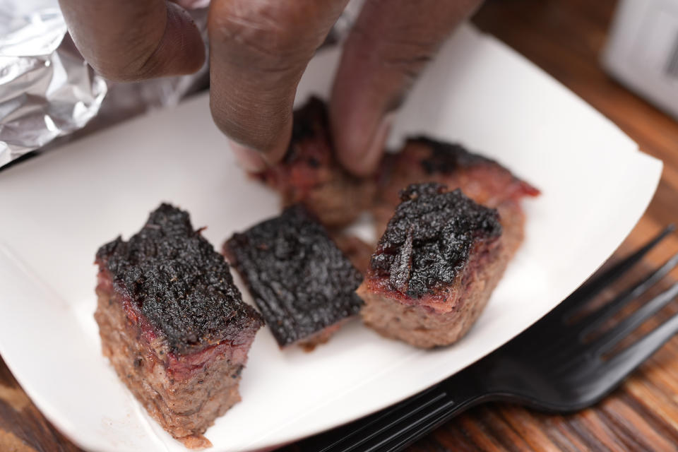 A sample of barbecue brisket burnt ends are seen at the World Championship Barbecue Cooking Contest, Friday, May 17, 2024, in Memphis, Tenn. (AP Photo/George Walker IV)