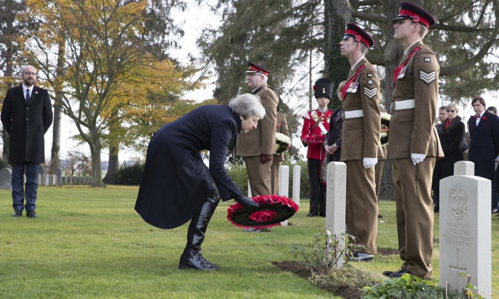 Theresa May lays a wreath in Belgium