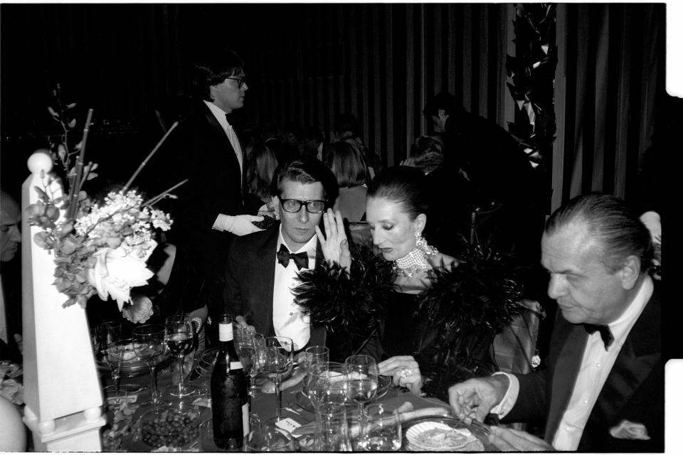 Yves Saint Laurent, an expressive Countess Jacqueline de Ribes, and Bill Blass at the 1983 Met gala.