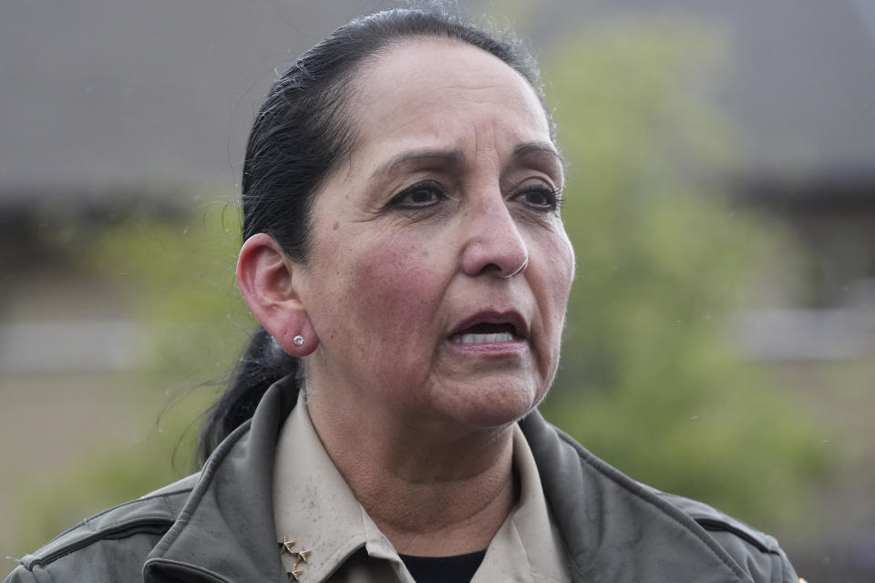 Salt Lake County Sheriff Rosie Rivera speaks to reporters at a staging area at Hidden Valley Park, Thursday, May 9, 2024, in Sandy, Utah. Two skiers were killed and one was rescued after an avalanche in the mountains outside of Salt Lake City. The slide happened after several days of spring snowstorms. (AP Photo/Rick Bowmer)