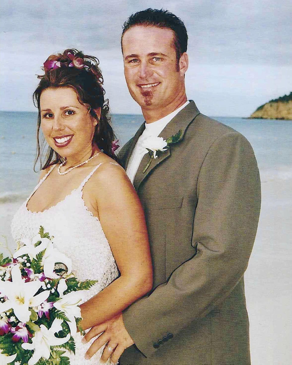 Cassondra Reynolds and her late husband, John, on their wedding day. John drank one energy drink a day before work.