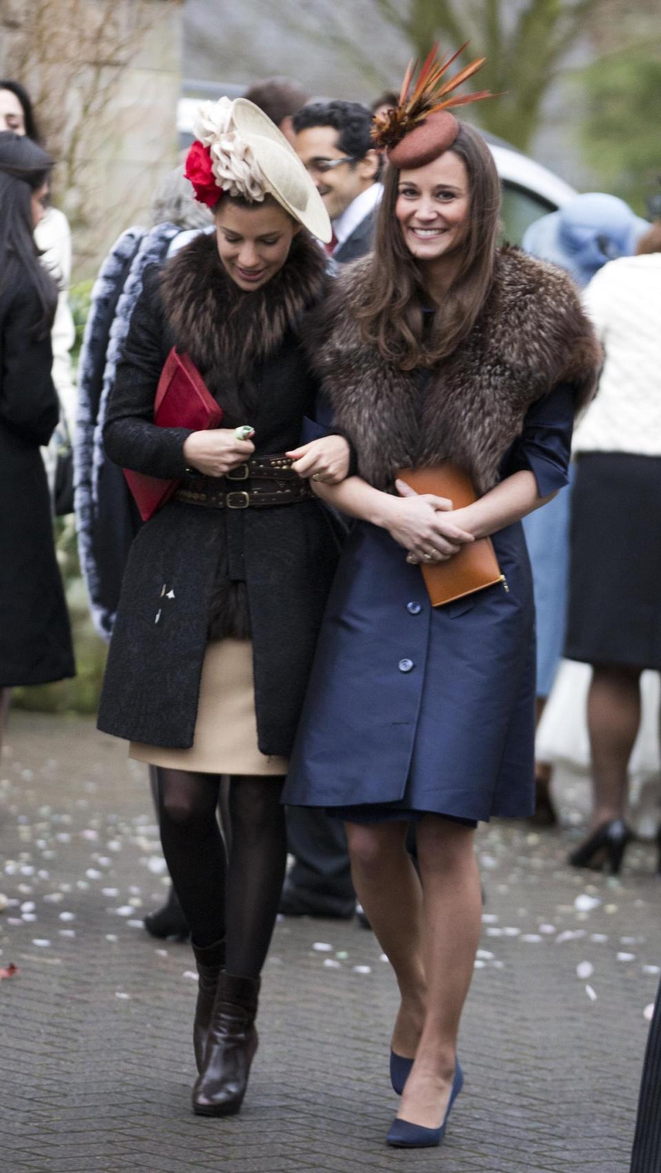 <p>What does one wear to a wedding in Northern Ireland in December? A warm coat and fur stole in autumnal, earthy shades.<em> (Photo: Rex)</em> </p>
