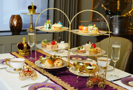 <p>To celebrate this year's Platinum Jubilee, Taj 51 Buckingham Gate Suites – itself just a stone's throw away from the palace – is offering a delicious upgrade on their existing tea. The Platinum Jubilee Afternoon Tea, served at its restaurant Kona, features a feast of inventive treats, including a chocolate bombe glaze served in a replica carriage and a sponge cake in the shape of an orb & sceptre. Every detail has been inspired by the Queen's 70 years of service. The ideal way to celebrate.</p><p><a href="https://www.tajhotels.com/en-in/taj/taj-51-buckingham-gate-suites-and-residences/restaurants/" rel="nofollow noopener" target="_blank" data-ylk="slk:Taj 51 Buckingham Gate Suites;elm:context_link;itc:0;sec:content-canvas" class="link ">Taj 51 Buckingham Gate Suites</a>, 51 Buckingham Gate, SW1E 6AF </p>