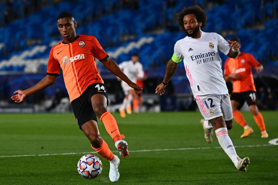 Shakhtar Donetsk's Brazilian forward Tete (L) challenges Real Madrid's Brazilian defender Marcelo during the UEFA Champions League group B football match between Real Madrid and Shakhtar Donetsk at the Alfredo di Stefano stadium in Valdebebas on the outskirts of Madrid on October 21, 2020. (Photo by GABRIEL BOUYS / AFP) (Photo by GABRIEL BOUYS/AFP via Getty Images)