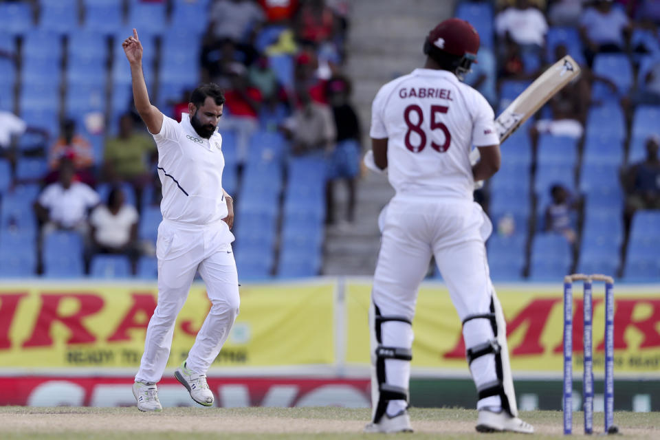 India's Mohammed Shami celebrates taking the wicket of West Indies' Shannon Gabriel during day four of the first Test cricket match at the Sir Vivian Richards cricket ground in North Sound, Antigua and Barbuda, Sunday, Aug. 25, 2019. (AP Photo/Ricardo Mazalan)