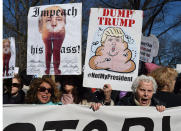 <p>Protesters march down Central Park West in New York City during a “Not My President’s Day” rally on Feb. 20, 201, as part of a protest against President Trump. (Timothy A. Clary/AFP/Getty Images) </p>