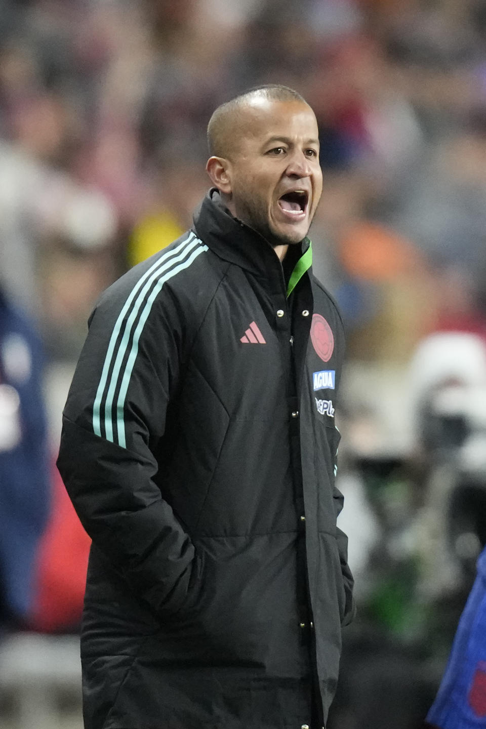 CORRECTS TO ANGELO MARSIGLIA, INSTEAD OF TWILA KILGORE - Colombia coach Angelo Marsiglia shouts to the team during the first half of an international friendly soccer match against the United States on Thursday, Oct. 26, 2023, in Sandy, Utah. (AP Photo/Rick Bowmer)