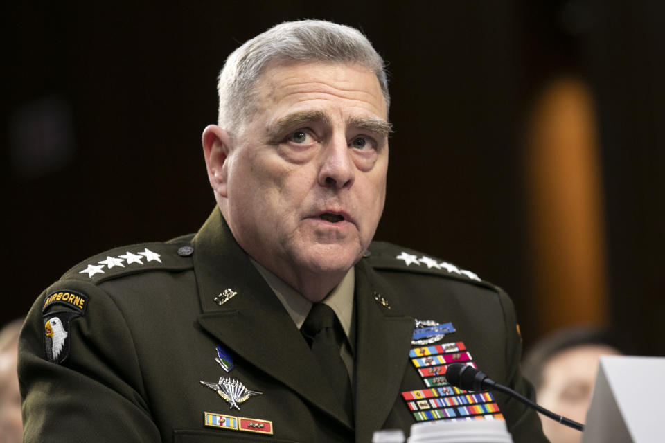 FILE - In this March 4, 2020, file photo, Chairman of the Joint Chiefs of Staff Gen. Mark Milley testifies to Senate Armed Services Committee about the budget on Capitol Hill in Washington. Milley crafted a low public profile in his first eight months on the job, but that changed after “the walk.” Milley walked with President Donald Trump and a presidential entourage across Lafayette Square on June 1 to be positioned near a church where Trump held up a Bible for photographers. (AP Photo/Jacquelyn Martin)