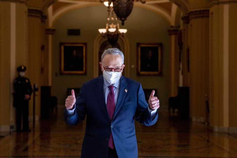 Senate Majority Leader Sen. Chuck Schumer, D-N.Y., gives a thumbs up after leaving the Senate chamber at the U.S. Capitol on March 6, 2021 in Washington.