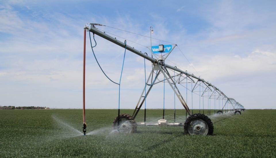 Center pivot irrigation systems like this one in Finney County pump water up from the Ogallala aquifer to spray on crops. This part of southwest Kansas experienced some of the state's worst aquifer declines last year as drought pushed farmers to pump more water from underground.