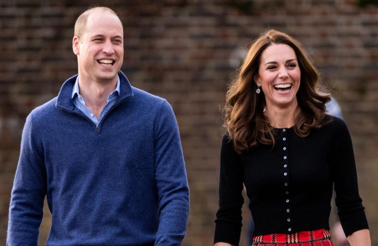prince william and kate middleton walking outside smiling