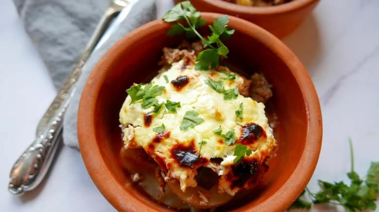 moussaka in orange bowl