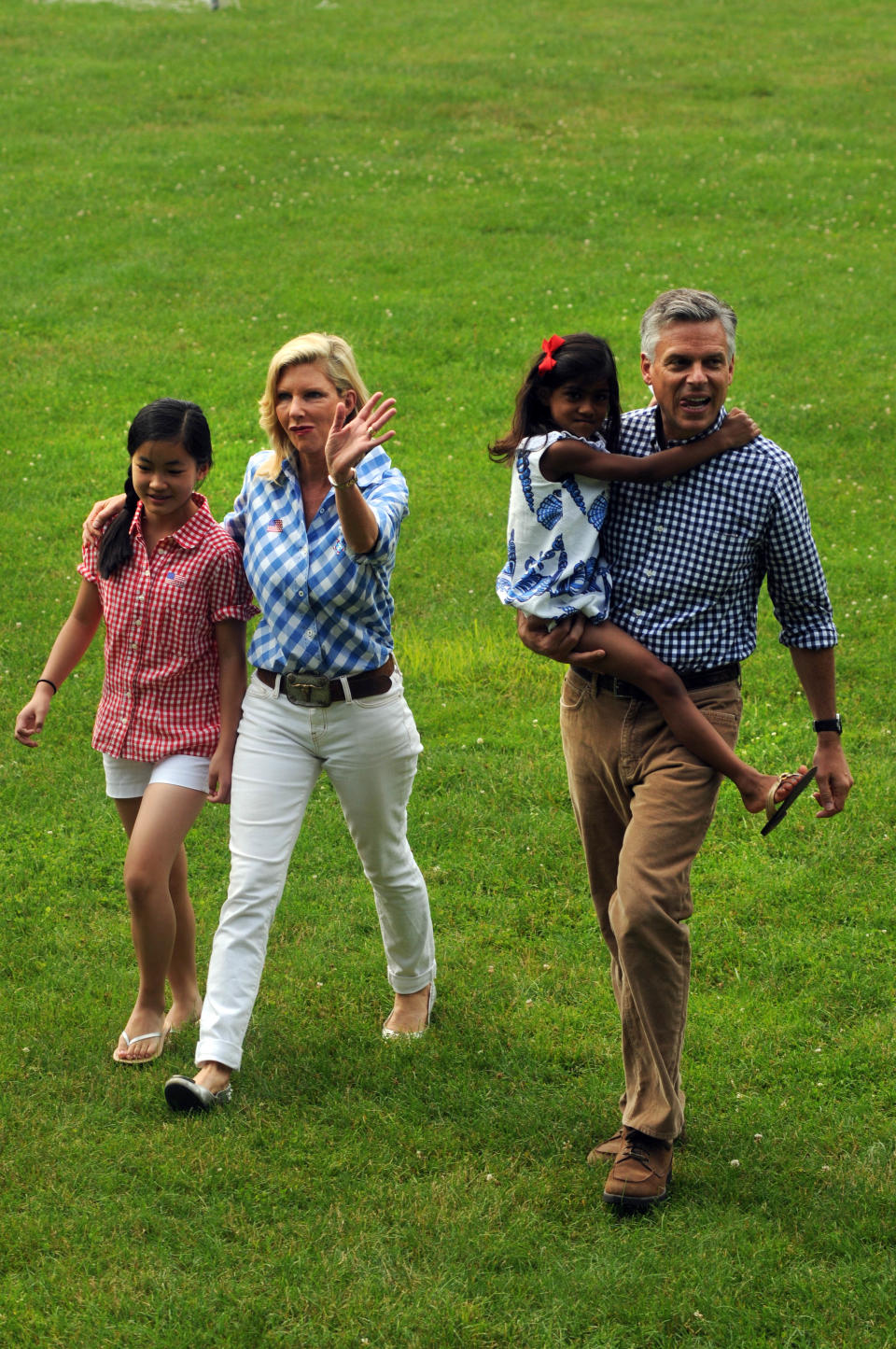 Republican Presidential Candidates Romney and Huntsman Campaign In New Hampshire On July 4th