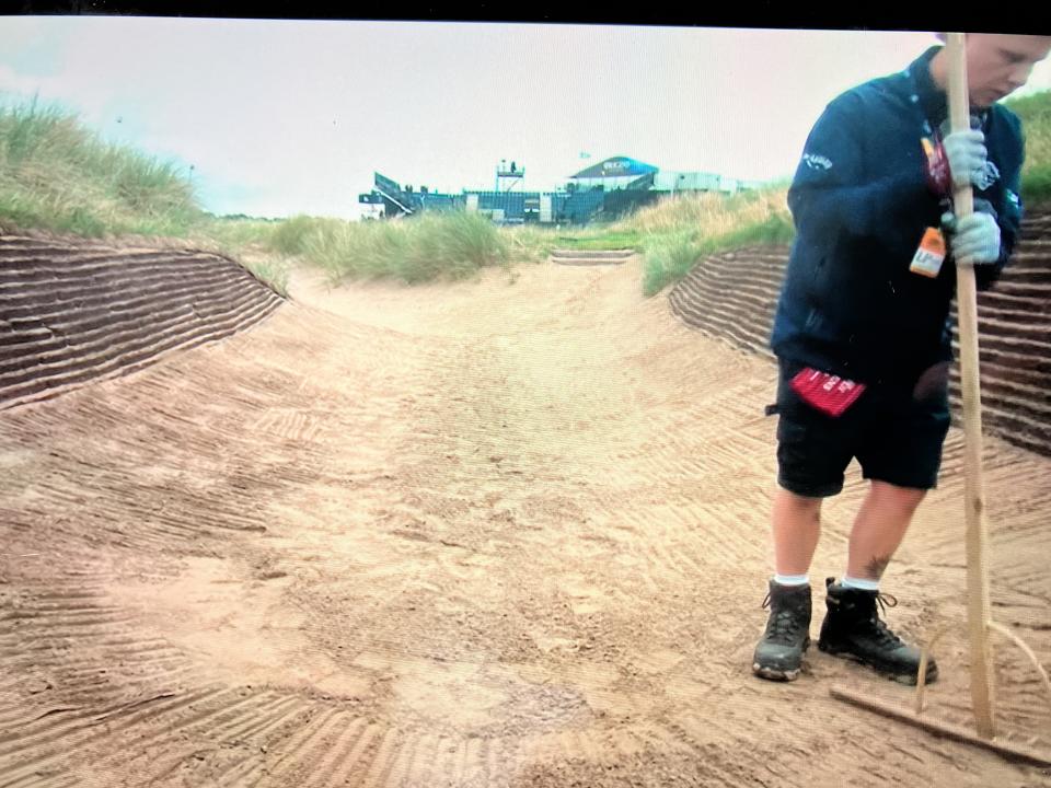 bunkers are being raked to reduce number of balls up against the face