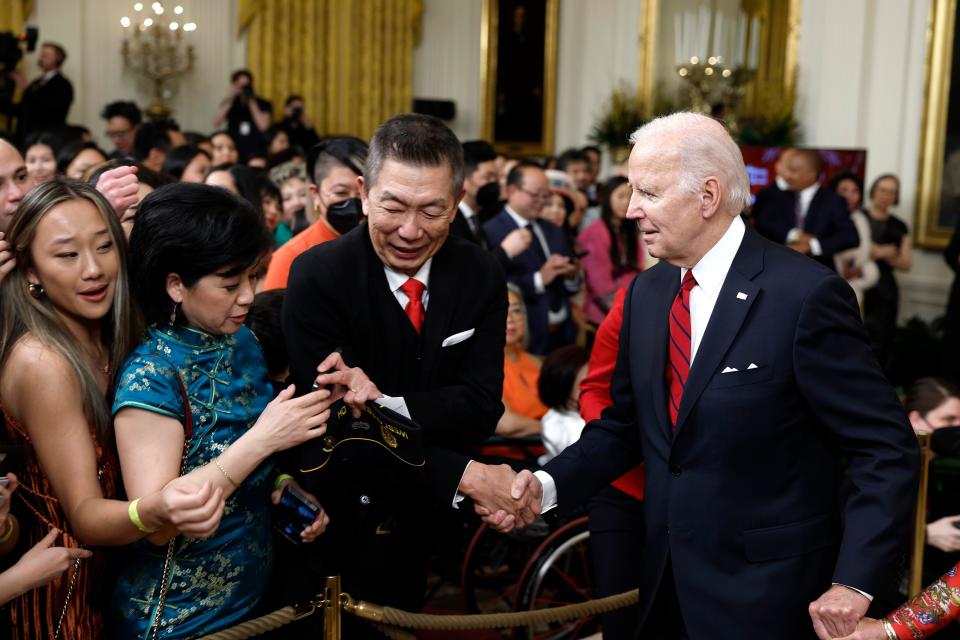 President Joe Biden greets guests at a reception celebrating Lunar New Year in the White House on January 26, 2023 in Washington, DC.