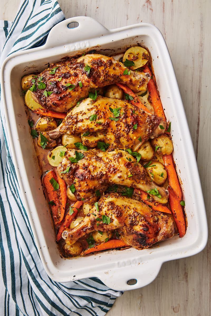 <p>A <a href="https://www.delish.com/uk/cooking/recipes/a28926109/classic-roast-chicken-recipe/" rel="nofollow noopener" target="_blank" data-ylk="slk:roasted chicken;elm:context_link;itc:0;sec:content-canvas" class="link ">roasted chicken</a> is one of our most perfect meals but most of the time we don't the solid 2 hours it takes to roast one. These baked chicken leg quarters are the perfect compromise. Glazed with mustard, maple syrup, and herbs and then roasted on top of potatoes and <a href="https://www.delish.com/uk/cooking/recipes/a29571518/oven-roasted-carrots-recipe/" rel="nofollow noopener" target="_blank" data-ylk="slk:carrots;elm:context_link;itc:0;sec:content-canvas" class="link ">carrots</a> for an award winning dinner. Veggies roasted under chicken will always be #1 in our hearts.</p><p>Get the <a href="https://www.delish.com/uk/cooking/recipes/a30725092/baked-chicken-leg-quarters-recipe/" rel="nofollow noopener" target="_blank" data-ylk="slk:Maple-Mustard Chicken Legs;elm:context_link;itc:0;sec:content-canvas" class="link ">Maple-Mustard Chicken Legs</a> recipe.</p>