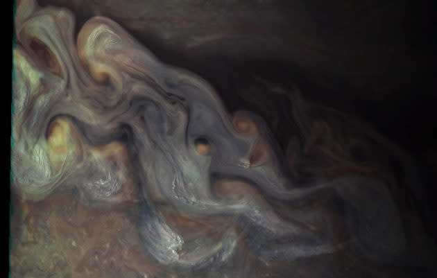 This image from the Juno probe reveals bright high clouds that are about 16 miles across and in some areas appear to form “squall lines.” On Jupiter, clouds this high are almost certainly composed of water and/or ammonia ice. (NASA / JPL-Caltech / SwRI / Gerald Eichstädt / Seán Doran)