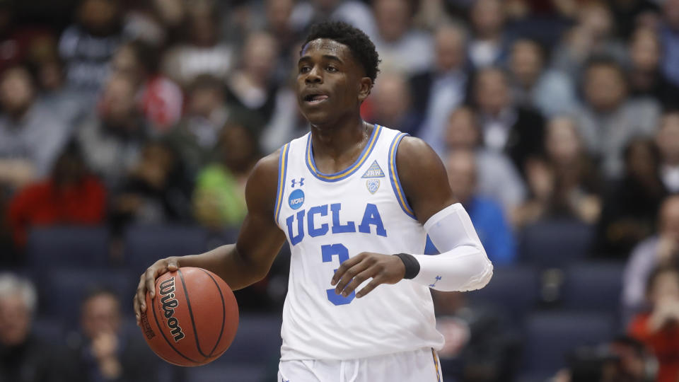 UCLA’s Aaron Holiday dribbles up the court during the first half of a First Four game of the NCAA men’s college basketball tournament against St. Bonaventure, Tuesday, March 13, 2018, in Dayton, Ohio. (AP Photo/John Minchillo)