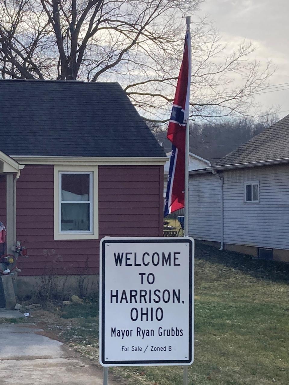 A second, smaller flagpole. Harrison Mayor Grubbs is concerned the signage makes it appear city-affiliated.