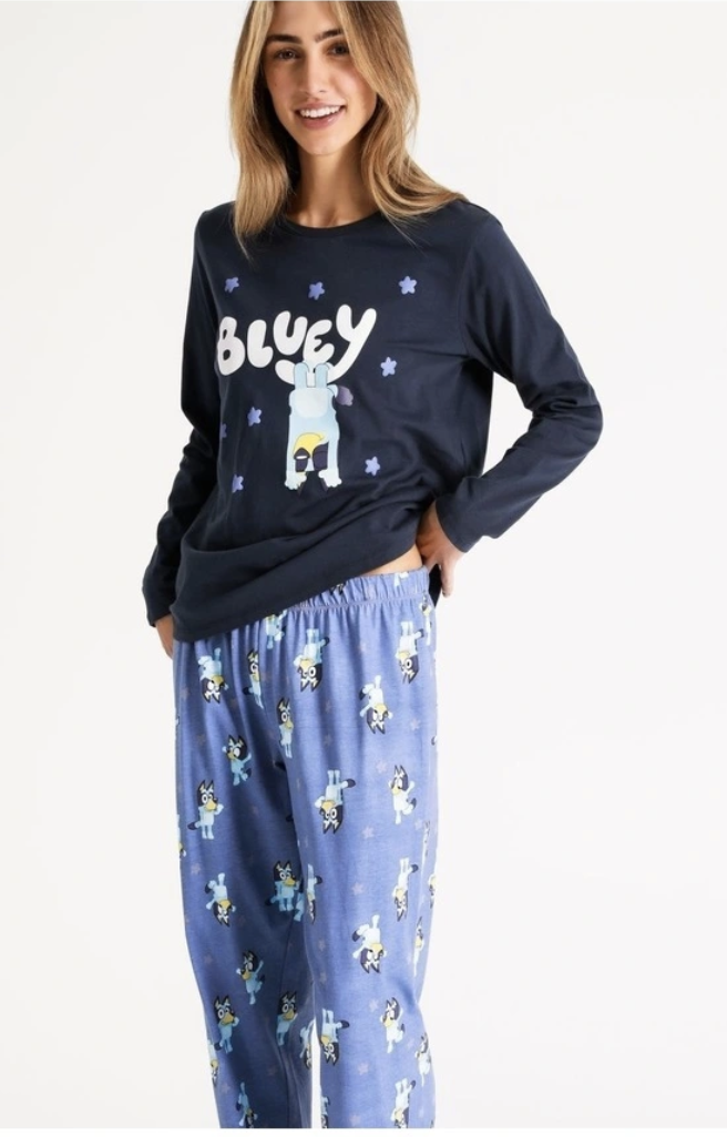 A model stands in pyjamas featuring the cartoon dog, Bluey