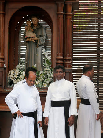 Priests are seen inside the St. Anthony's Shrine, Kochchikade church after an explosion in Colombo, Sri Lanka April 21, 2019. REUTERS/Dinuka Liyanawatte