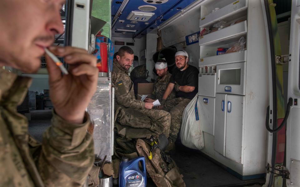 Wounded soldiers in an ambulance at Kramatorsk General Hospital. - Julian Simmonds for The Telegraph/Julian Simmonds for The Telegraph
