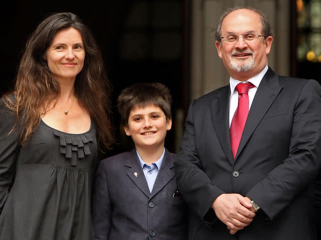 <p>Cate Gillon/Getty</p> Salman Rushdie, Elizabeth West, and their son Milan Rushdie leave High Court on August 26, 2008 in London, England.