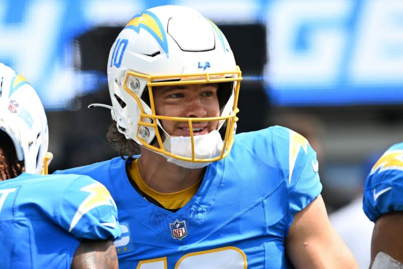 Los Angeles Chargers quarterback Justin Herbert laughs with teammates before a game against the Miami Dolphins on Sunday at SoFi Stadium in Inglewood, Calif. Photo by Jon SooHoo/UPI