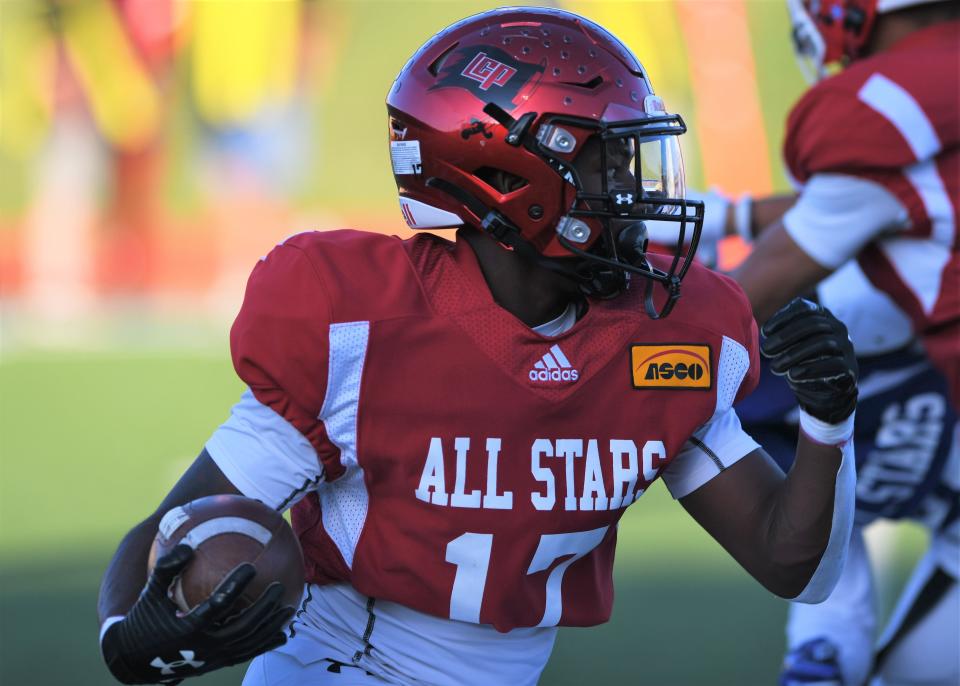 Lubbock-Cooper's Ju'Raylin Shaw returns a kick in the ASCO All-Star Classic football game Saturday, June 4, 2022, at Lowrey Field in Lubbock.