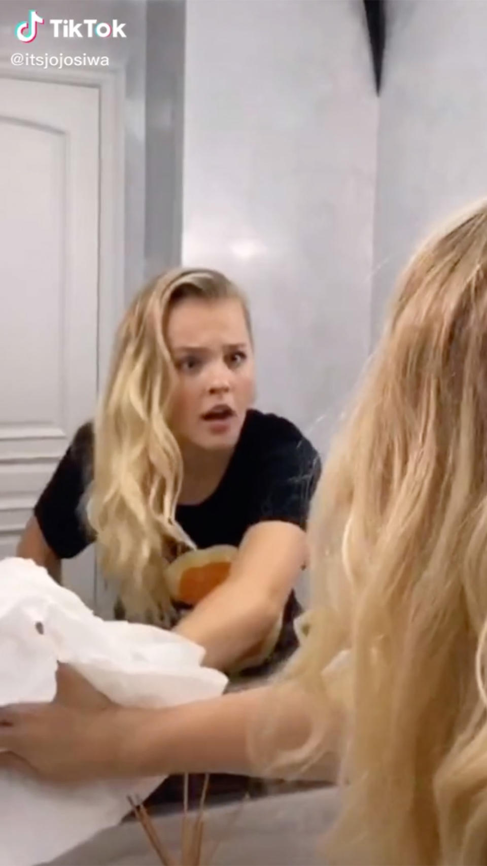 <p>In 2020, the 17-year-old shocked fans when she<a href="https://people.com/style/jojo-siwa-shows-off-natural-curly-hair-in-tiktok-video/" rel="nofollow noopener" target="_blank" data-ylk="slk:ditched her iconic side pony, accessories and colorful outfits;elm:context_link;itc:0;sec:content-canvas" class="link "> ditched her iconic side pony, accessories and colorful outfits</a> on TikTok. </p>