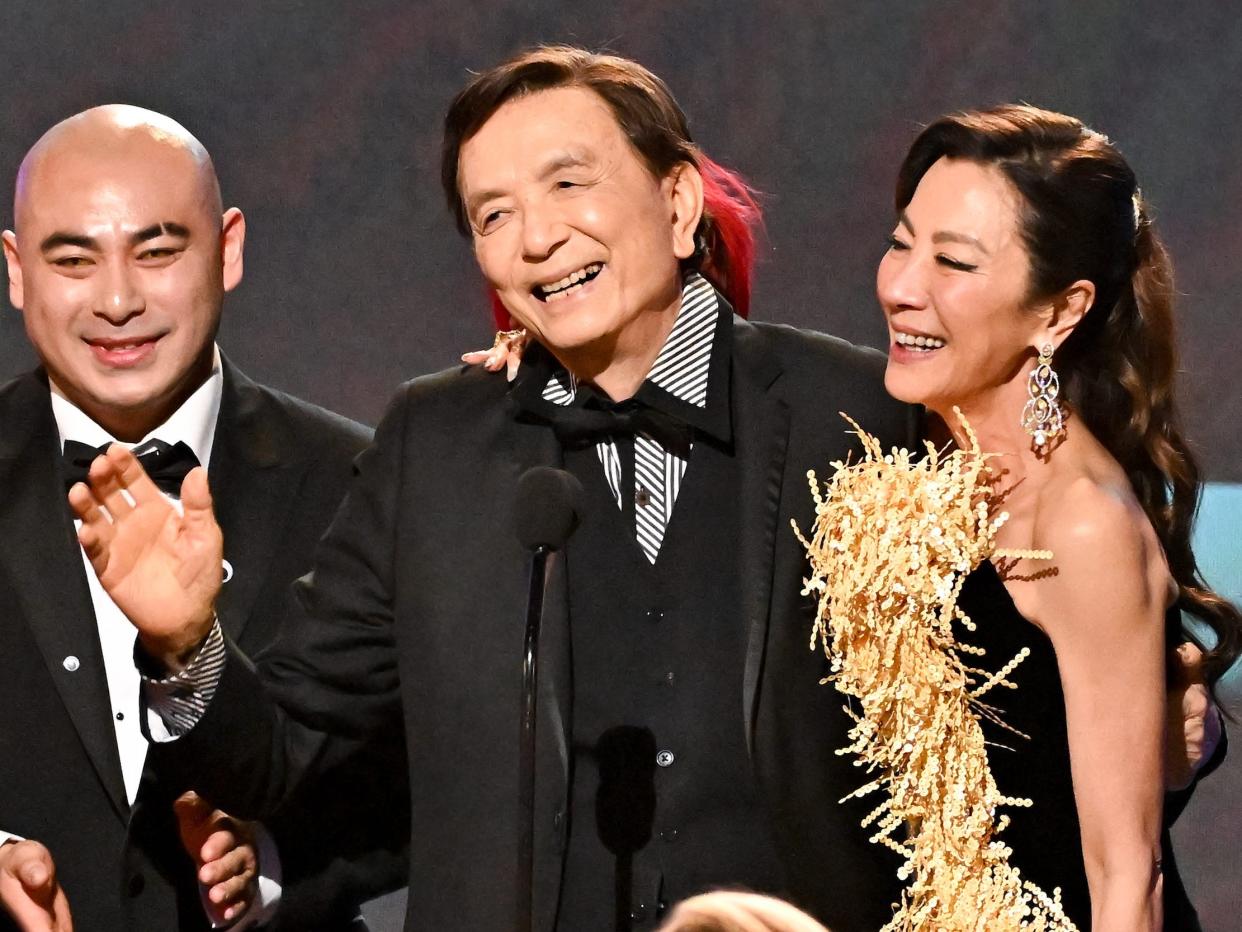 Brian Le, James Hong, and Michelle Yeoh accept the outstanding performance by a cast in a motion picture award for "Everything Everywhere All at Once" at the 2023 SAG awards.