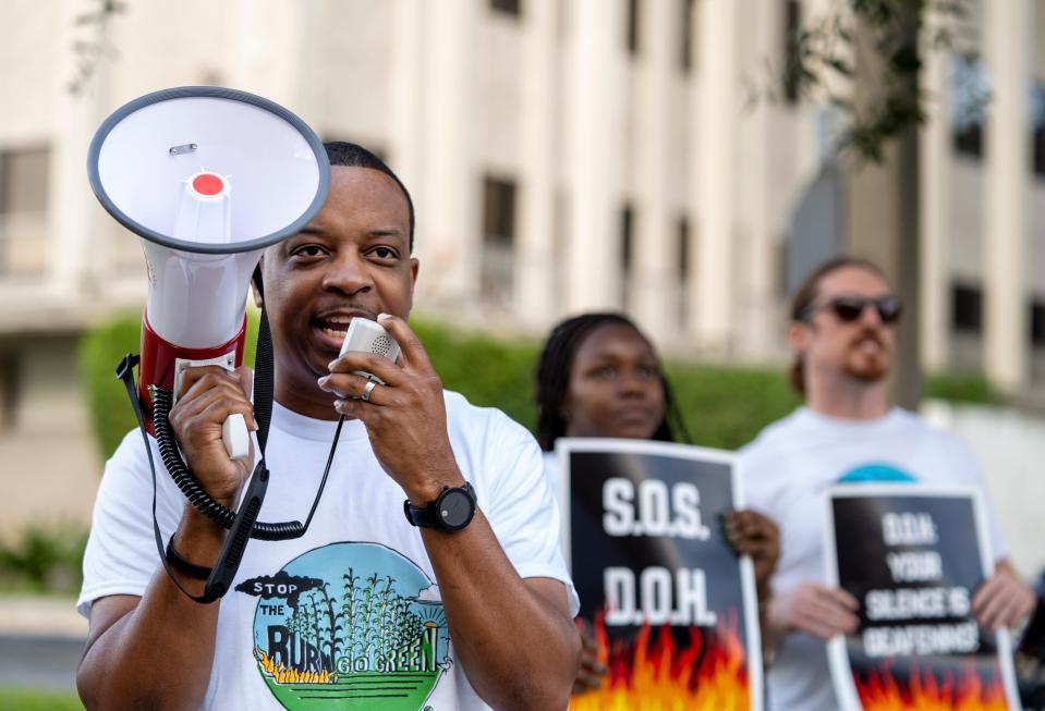 Steve Messam of Stop the Burn protests Wednesday outside the Palm Beach County Department of Health.