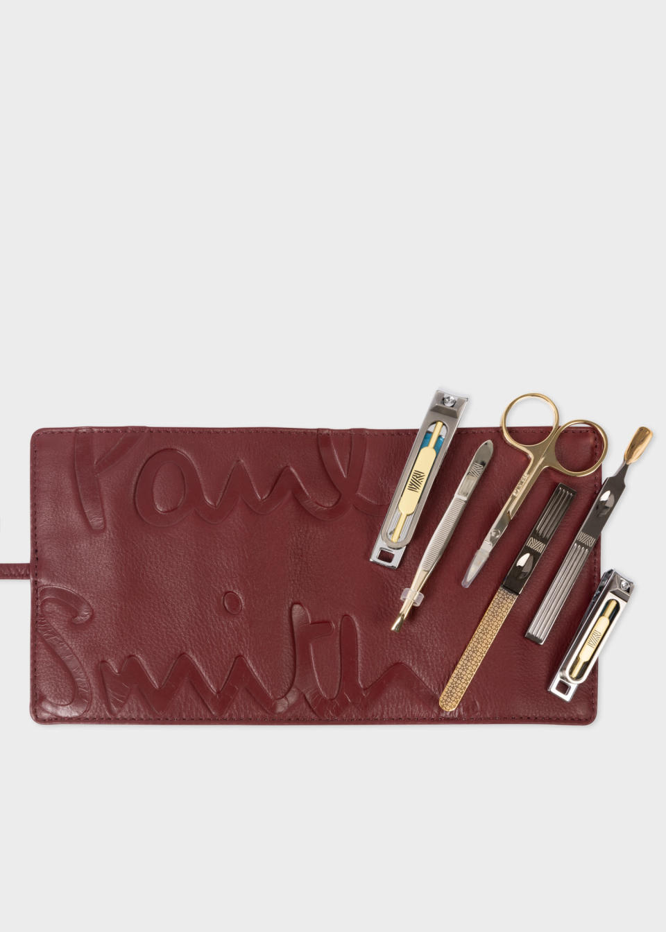 <p><a href="https://go.redirectingat.com?id=74968X1596630&url=https%3A%2F%2Fwww.paulsmith.com%2Fus%2Fpaul-smith-mantidy-burgundy-leather-grooming-roll-set%3Fgclid%3DCj0KCQjw9rSoBhCiARIsAFOiplk2Au203EXVNsv81unI56GyXVt_IGW5vcKO2fPXD2bbwoCFzDNWRboaAptzEALw_wcB%26gclsrc%3Daw.ds&sref=https%3A%2F%2Fwww.esquire.com%2Flifestyle%2Fg41324816%2Fbest-uncle-gifts%2F" rel="nofollow noopener" target="_blank" data-ylk="slk:Shop Now;elm:context_link;itc:0;sec:content-canvas" class="link ">Shop Now</a></p><p>x Mantidy Leather Grooming Roll</p><p>paulsmith.com</p><p>$135.00</p>