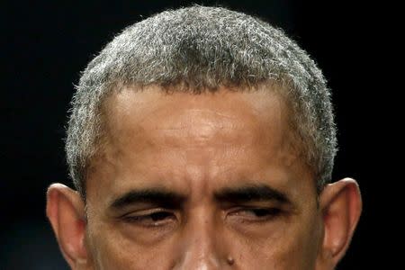 U.S. President Barack Obama participates in a town hall meeting with Young Southeast Asian Leaders Initiative (YSEALI) attendees at Taylor's University in Kuala Lumpur, Malaysia November 20, 2015, before attending the ASEAN summit meeting. During the event, Obama chided some of his fellow world leaders for coloring their hair to look young. REUTERS/Jonathan Ernst